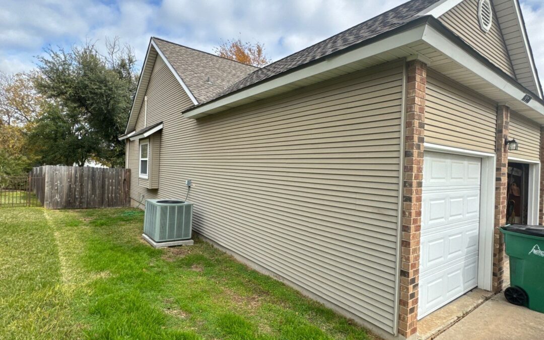 lap siding installation on side of home